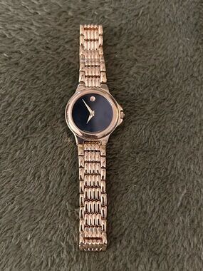 Movado Museum Woman’s Watch, Gold Tone, Black Dial Bracelet, Pristine, 6.5